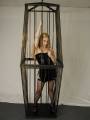 Amateur blonde teen in fetish cage